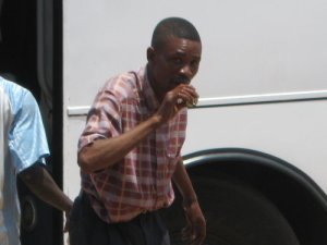 A man cleaning a fuel filter with his mouth. Tasty.