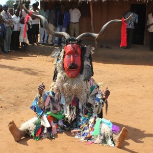 After finishing his dance, this Gule Wamkulu figure sat and waited for people to give him money. To me, this indicates that what once may have been something with real spiritual significance to the Chewa people has now evolved into something hollow.